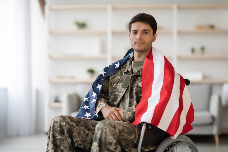 handsome-military-guy-in-wheelchair-with-flag-of-t-2022-02-16-05-16-02-utc (1)web